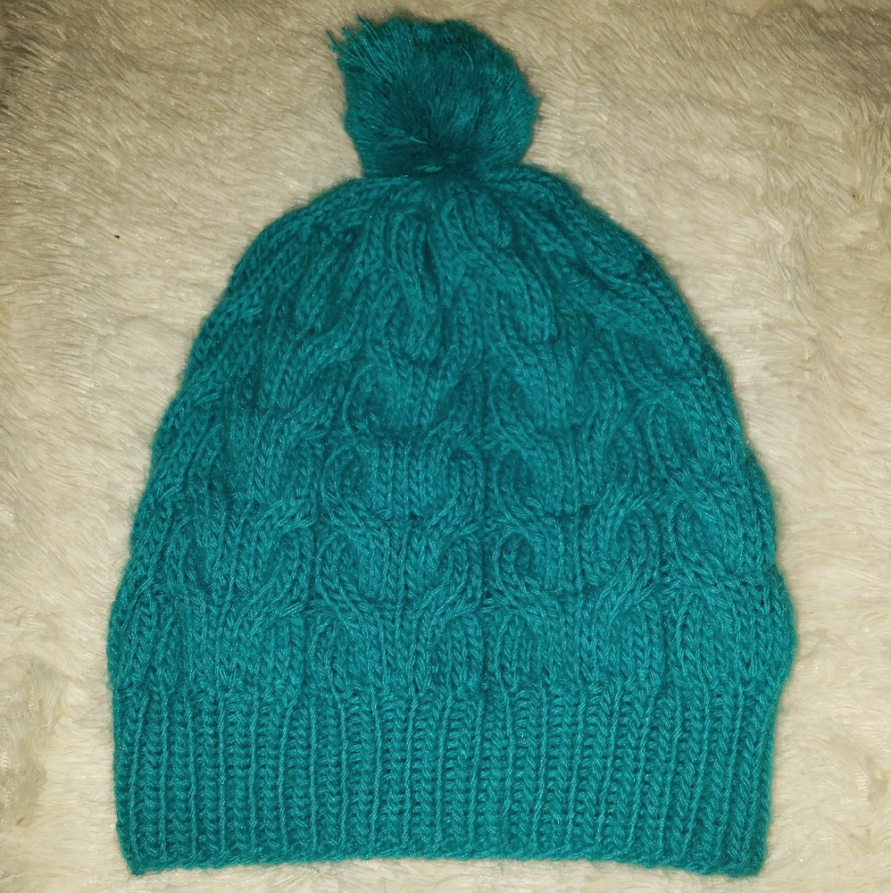 Alpaca Fiber Beanie with pom pom.